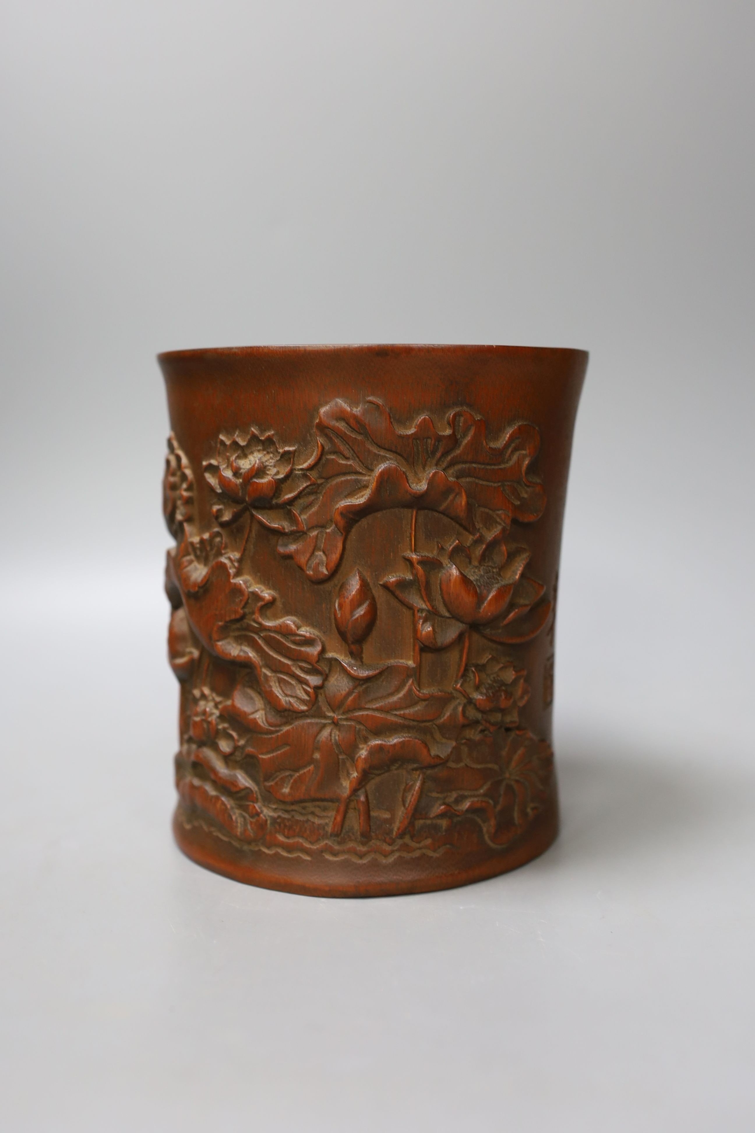 A Chinese carved bamboo brush pot - 15cm tall